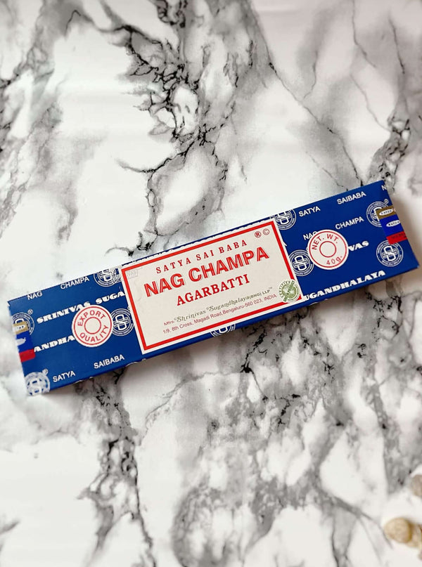 Sacred Incense Sticks // Nag Champa  Magical Properties:  Calms the nervous system and reduces stress, while creating a relaxing ambience for your space,  A wonderful tool to use during meditation, yoga, journaling, manifestation, smudging/purifying ritual and other spiritual ceremonies.   These agarbatti are hand-rolled according to the ancient natural purity masala traditions.  40g pack ca. 30 sticks