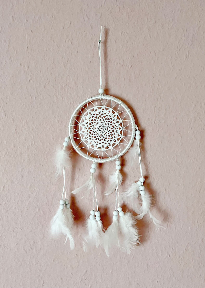 Sacred Boho Dream Catcher - White  Dream Catchers were traditionally made by the Native American Peoples to filter dreams, allowing only the good dreams to pass through, while catching and dispelling the bad dreams or nightmares in the web.  Dream Catchers protect from evil and negativity, while encouraging a deep and peaceful sleep.