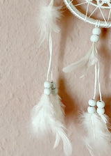 Sacred Boho Dream Catcher - White  Dream Catchers were traditionally made by the Native American Peoples to filter dreams, allowing only the good dreams to pass through, while catching and dispelling the bad dreams or nightmares in the web.  Dream Catchers protect from evil and negativity, while encouraging a deep and peaceful sleep.